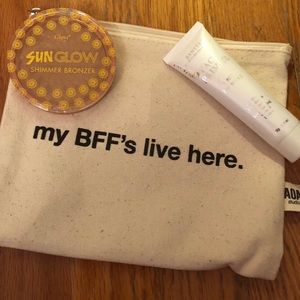 Unused primer, bronzer and makeup bag!